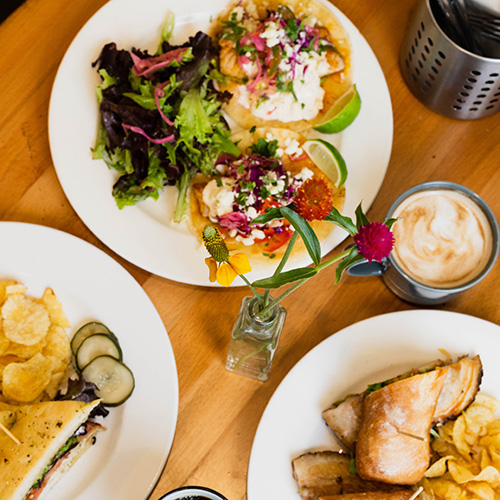 TBT-About-Intro_table-full-of-food Restaurant table full of food